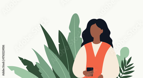 Young woman with dark skin and long hair holding a phone surrounded by large green leaves.