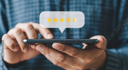 Five Stars Rating Review on Smartphone Screen for Customer Satisfaction and Feedback