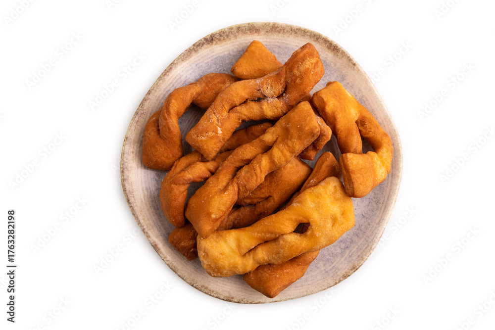 Fototapeta premium Crunchy biscuit Brushwood cookies isolated on white, top view, flat lay, close up