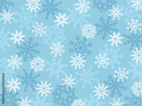 冬の爽やかな雪の結晶の背景　ブルー