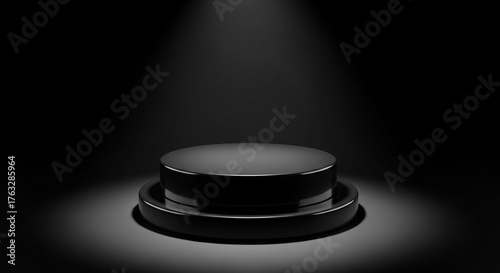 A black pedestal illuminated by a spotlight against a dark background, showcasing an object.