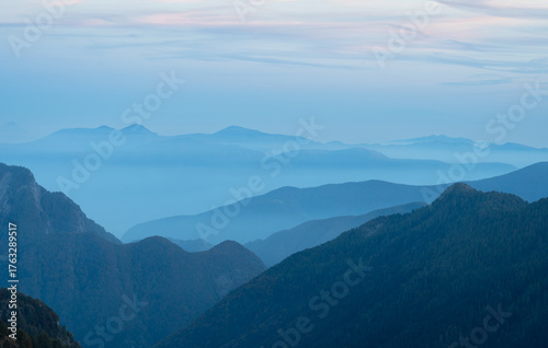Layered mountains during dusk in the Ticino maountains. Seen from Capanna Ribia.