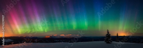 Wallpaper Mural Breathtaking aurora borealis, Northern Lights over a serene winter landscape, snow-covered mountains, vibrant green, purple, and blue sky, magical travel background, natural wonder. Torontodigital.ca