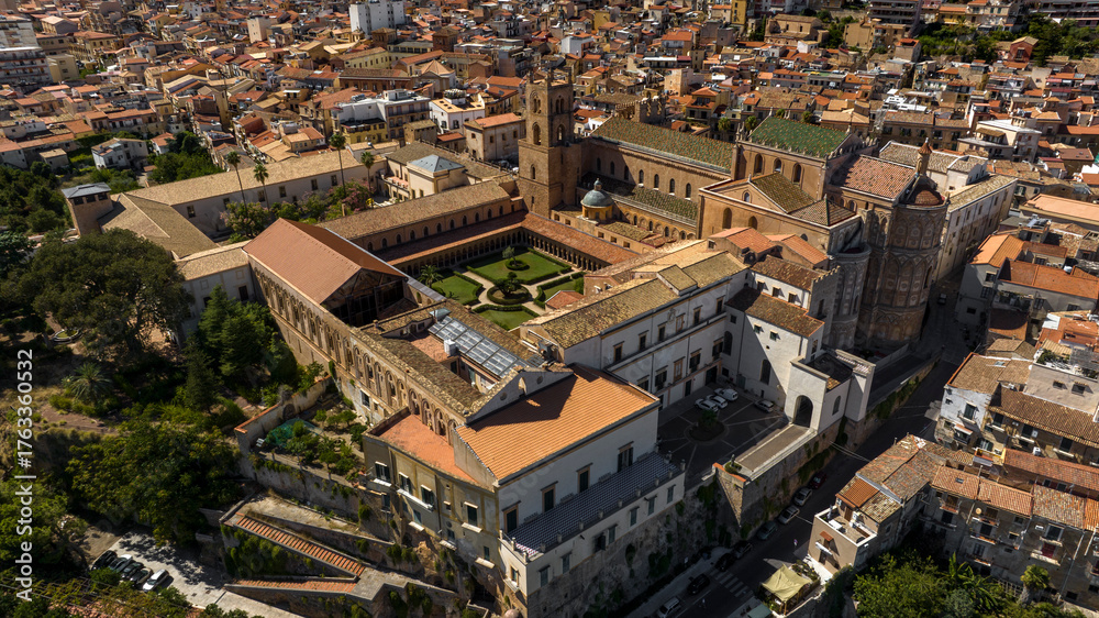 Obraz premium Aerial view of Monreale Cathedral. It is a Catholic church, a masterpiece of Norman architecture, located in the historic center of the town in the metropolitan city of Palermo, Sicily, Italy.