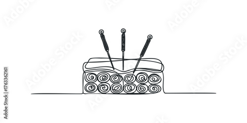 Acupuncture needles inserted into layered skin tissue