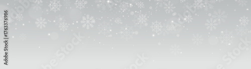 Whirling snow and frosty dust over a transparent layer create a sense of motion and cold air.