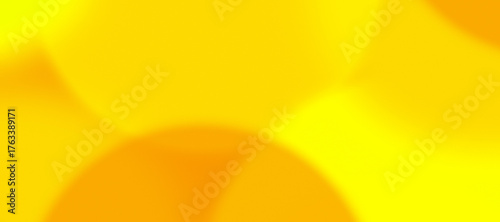 Obraz na płótnie abstract yellow background with circles of different sizes and blurriness