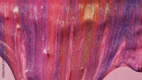 Vibrant Metallic Paint Dripping Downwards Creating an Abstract Flowing Art Background with Shimmering Pink Purple and Gold Hues Dynamic Liquid Movement.