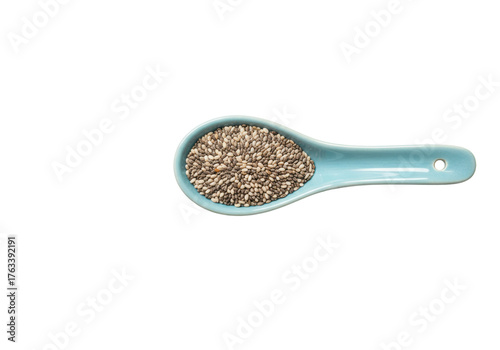 Photography Isolated turquoise spoon containing chia seeds, a nutrient dense superfood for good health
