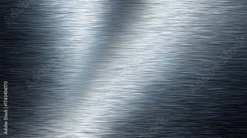 A polished metallic surface, reflecting light with subtle variations and textures