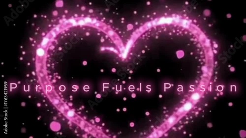 Sparkling pink heart with the words purpose fuels passion on black background