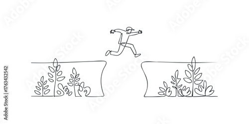 Man jumping over gap with plant growth