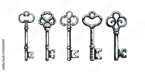 Five ornate antique keys on white background