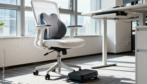 modern ergonomic office chair in bright workspace with lumbar support and footrest