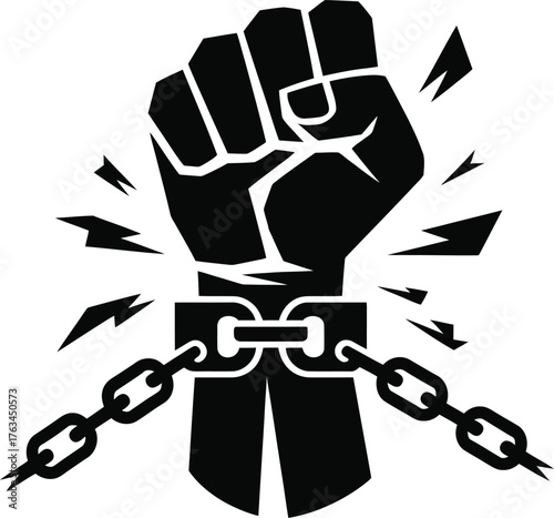 Powerful silhouette of a clenched fist breaking a metal chain symbolizing freedom and strength