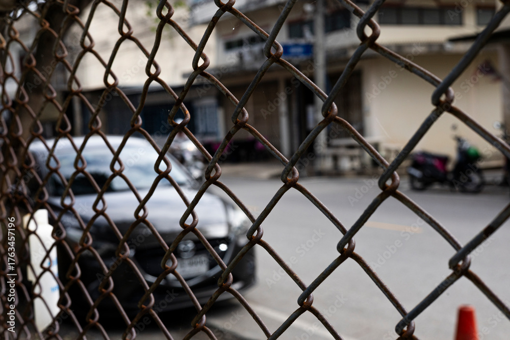 Fototapeta premium Close Up Of Steel Wire Mesh Gate