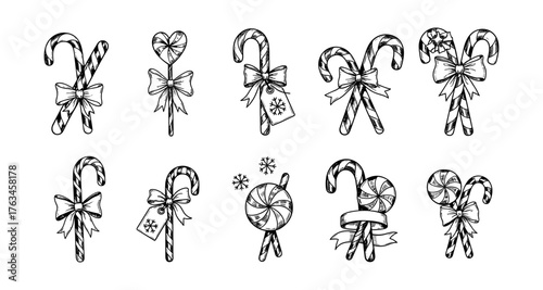 Festive black and white candy cane designs with bows and snowflakes for holiday decor