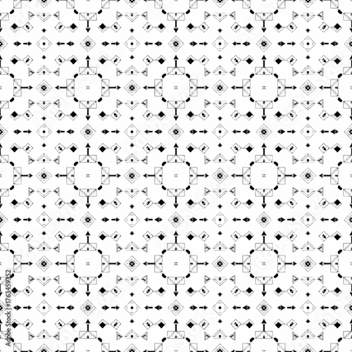 A seamless black and white geometric pattern with repeating square motifs and intricate details.