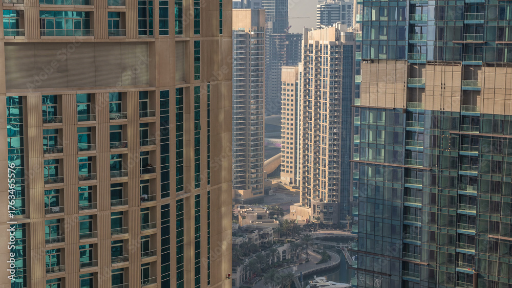 Obraz premium Dubai skyline with skyscrapers timelapse at Dubai Marina from above.