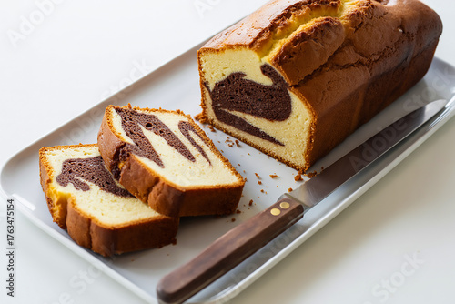 Delicious Marble Cake Slice on White Plate | Homemade Dessert with Chocolate and Vanilla Swirls Perfect for Bakery and Food Photography