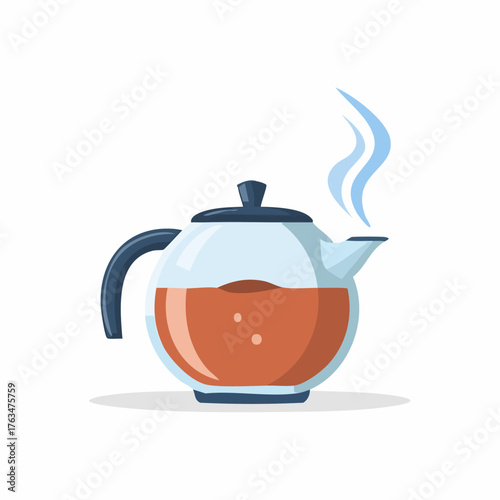 Glass teapot with hot tea and steam rising from spout.