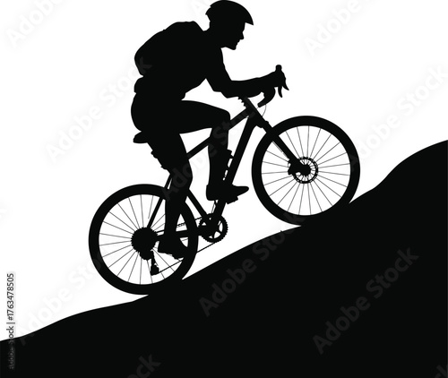 Dynamic silhouette of a determined cyclist conquering an uphill climb on a bicycle