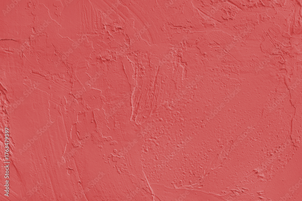 Fototapeta premium Close up, macro of red painted textured stucco wall with rough plaster, concrete surface texture. Abstract background, backdrop for design, wallpaper art or decoration projects.