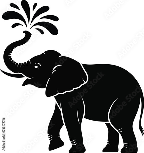 Majestic elephant spraying water from trunk silhouette in motion