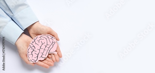 Hands holding paper human b...