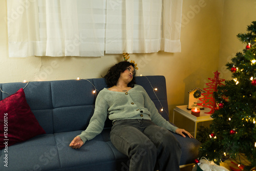 Woman feeling tired after christmas celebration party