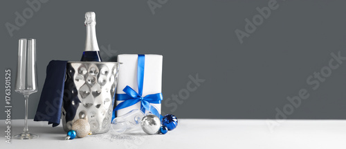 Ice bucket with bottle of c...
