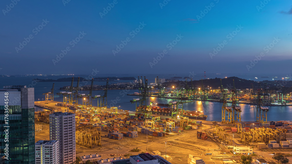 Naklejka premium Commercial port of Singapore aerial day to night timelapse.