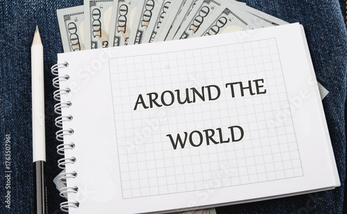 Konstfotografi A spiral notebook lies open, featuring the phrase Around the World, surrounded b