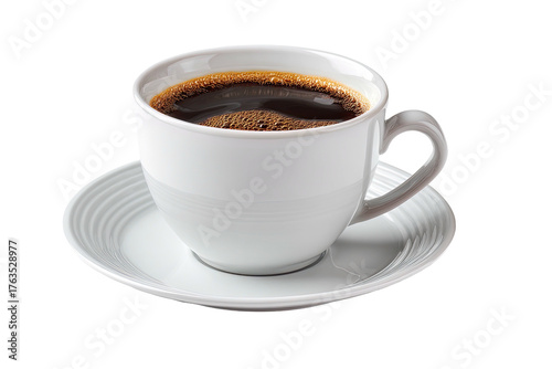 White ceramic coffee cup filled with dark roasted beverage, resting on a saucer