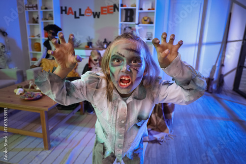 Scary little girl dressed a...