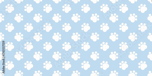 Cute seamless pattern of white paw prints on a soft blue background. Cat paw seamless pattern background. Dog paw seamless pattern background. Bear paw seamless pattern background. 