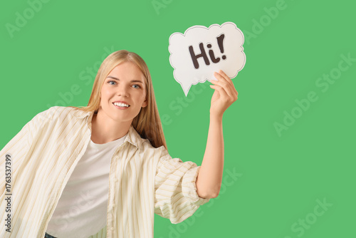 Young woman holding speech ...