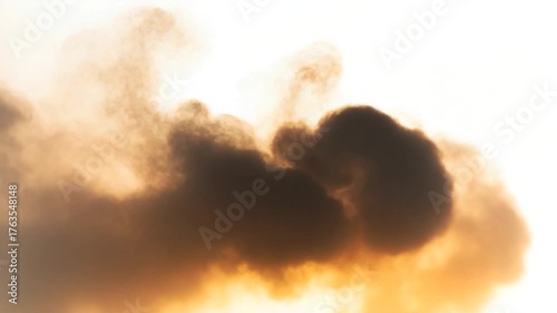 A plane soaring through a thick cloud of smoke