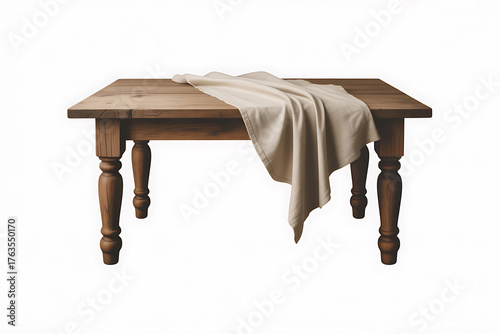 Rustic wooden table draped with a soft, neutral-toned cloth, conveying warmth and simplicity.