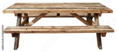 A detailed, front-facing view of a rustic, wooden outdoor picnic table, isolated on black background