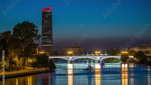 Seville skyline day to night timelapse with Torre Sevilla and Triana Bridge