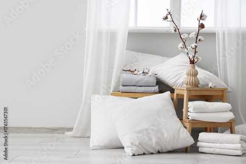 Clean white bedroom interio...