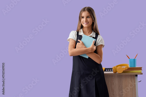 Dreamy teenage schoolgirl w...