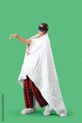 Female sleepwalker in pajam...