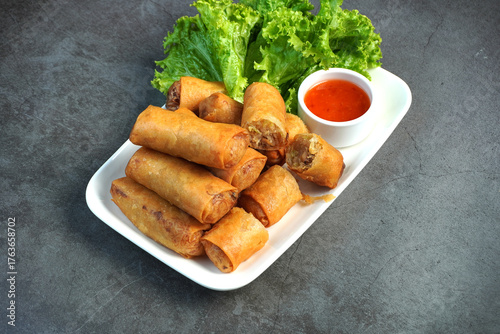 Fried spring rolls, dough stuffed with vegetables and pork,