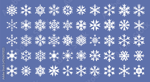 Collection of white snowflakes on blue background for winter editable