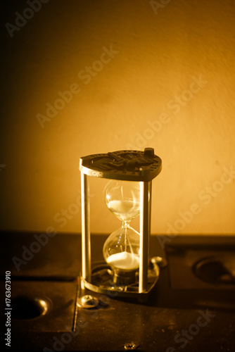 hourglass on wooden background