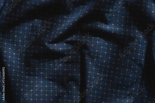 Abstract structure- wrinkles on the fabric. Textile-  simple dark background