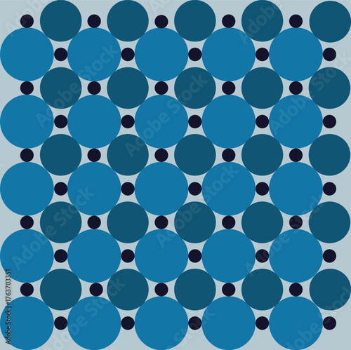 Pattern created from shades of blue and different size circles on a pale blue background