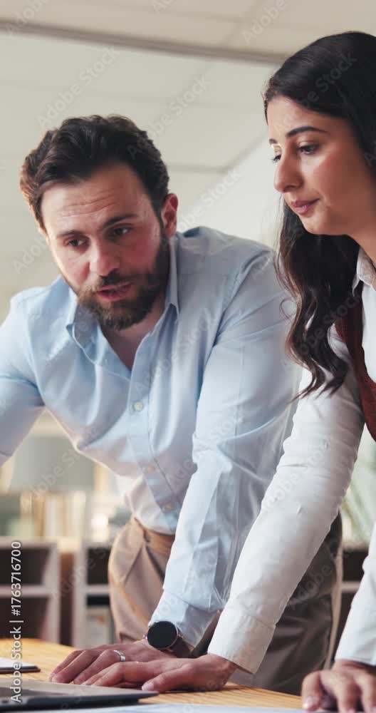 Office, man and woman with laptop, marketing strategy and discussion for project, teamwork and plan. Business, collaboration and people with tech for ad campaign, conversation and ideas on website